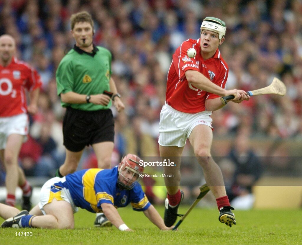 10 July 2004; Niall McCarthy, Cork, in action against Diarmuid Fitzgerald, Tipperary. Guinness Senior Hurling Championship Qualifier, Round 3, Cork v Tipperary, Fitzgerald Stadium, Killarney, Co. Kerry. Picture credit; Brendan Moran / SPORTSFILE