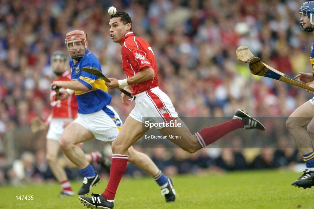 10 July 2004; Sean Og O'hAilpin, Cork, in action against Declan Fanning, Tipperary. Guinness Senior Hurling Championship Qualifier, Round 3, Cork v Tipperary, Fitzgerald Stadium, Killarney, Co. Kerry. Picture credit; Brendan Moran / SPORTSFILE