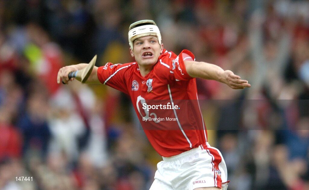 10 July 2004; Niall McCarthy, Cork, celebrates scoring his sides second goal against Tipperary by throwing his hurley in the air. Guinness Senior Hurling Championship Qualifier, Round 3, Cork v Tipperary, Fitzgerald Stadium, Killarney, Co. Kerry. Picture credit; Brendan Moran / SPORTSFILE