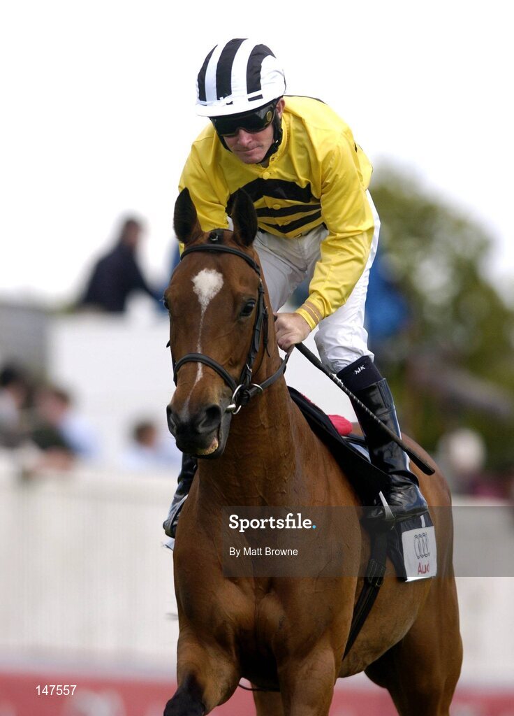 26 June 2004; Livadiya, with Mick Kinane up, on their way to the start of the Audi Pretty Polly Stakes. Curragh Racecourse, Co. Kildare. Picture credit; Matt Browne / SPORTSFILE