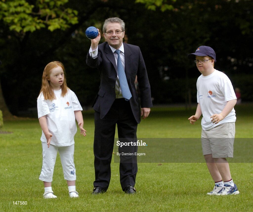 20 July 2004; Dr Phil Nolan, CEO of eircom, demonstrates Bocce, one of two new sports to Special Olympics Ireland, with Special Olympics Ireland athletes, Philip Walsh, aged 11, from Malahide, and Helena Roche, aged 9, from Raheny, both from Bayside Gym Club, at a photocall to celebrate eircom's 19 year support of the programme and announce details of eircom's continuing premier sponsorship of Special Olympics Ireland. Dublin. Picture credit; Damien Eagers / SPORTSFILE