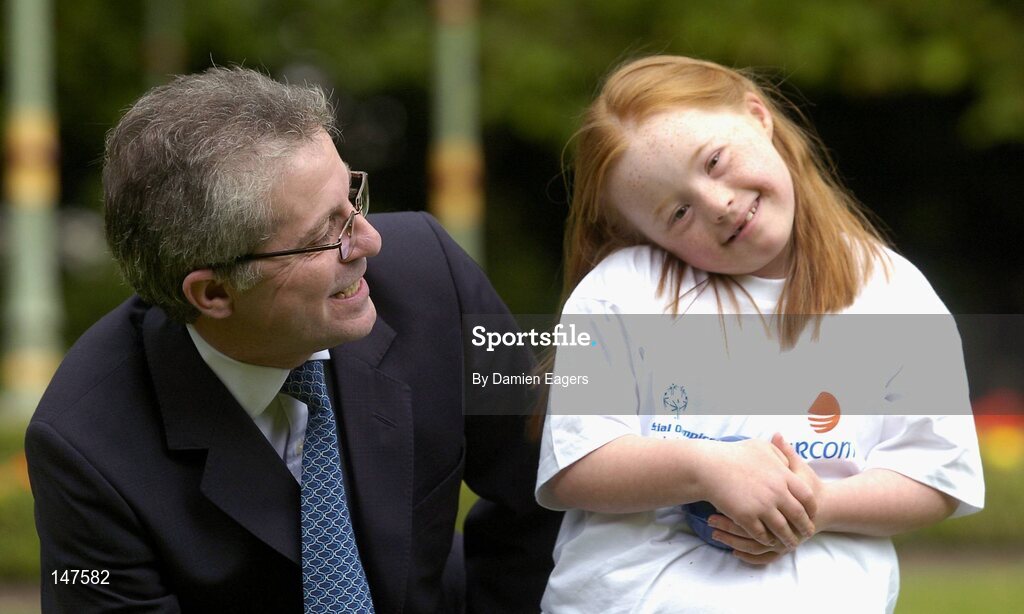 20 July 2004; Dr Phil Nolan, CEO of eircom, with Special Olympics Ireland athlete Helena Roche, aged 9, from Raheny, a member of Bayside Gym Club, at a photocall to celebrate eircom's 19 year support of the programme and announce details of eircom's continuing premier sponsorship of Special Olympics Ireland. Dublin. Picture credit; Damien Eagers / SPORTSFILE