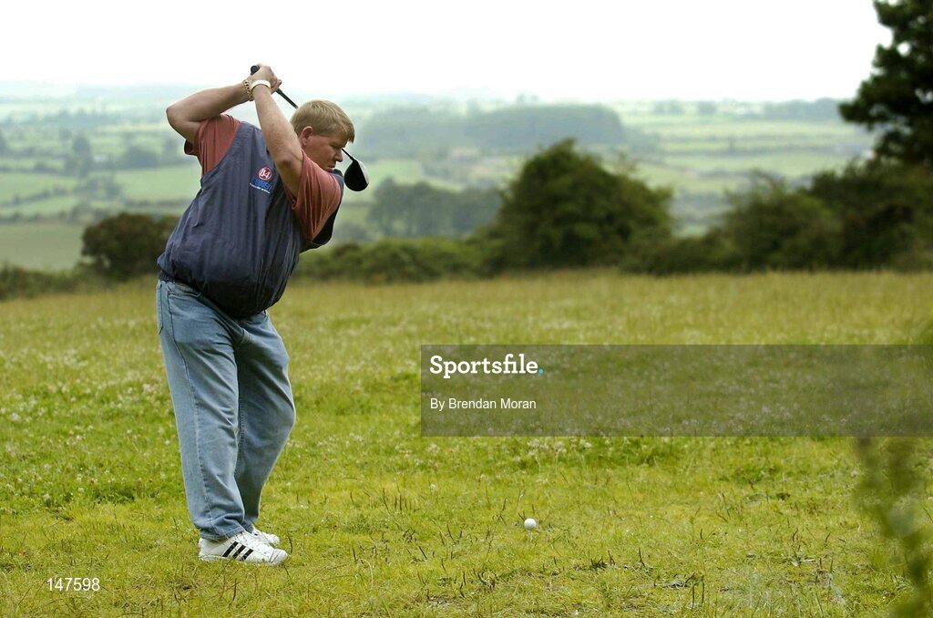 20 July 2004; John Daly, double Major winner and one of golf's most colourful players, makes a drive from what will be the first tee box  while he was in Blarney, Co. Cork, to finalise plans for the new Blarney Golf Resort Championship course which he designed in conjunction with Mel Flanagan of Irish Golf Design. Picture credit; Brendan Moran / SPORTSFILE