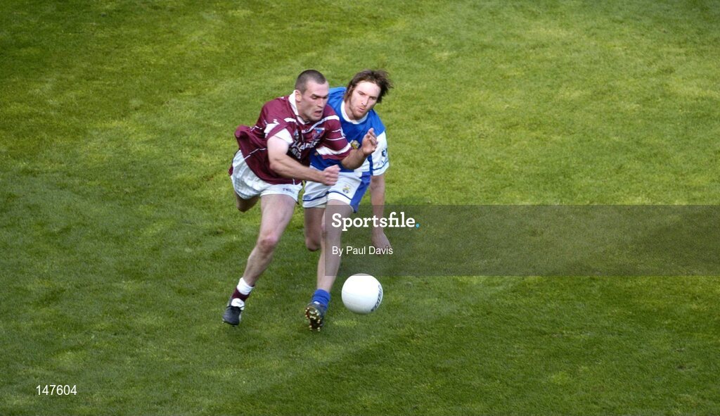 18 July 2004; Colm Parkinson, Laois, in action against Michael Ennis, Westmeath. Bank of Ireland Leinster Senior Football Championship Final, Laois v Westmeath, Croke Park, Dublin. Picture credit; Ray McManus / SPORTSFILE
