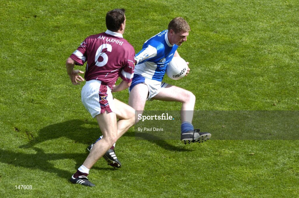 18 July 2004; Brian McDonald, Laois, in action against Damien Healy, Westmeath. Bank of Ireland Leinster Senior Football Championship Final, Laois v Westmeath, Croke Park, Dublin. Picture credit; Ray McManus / SPORTSFILE