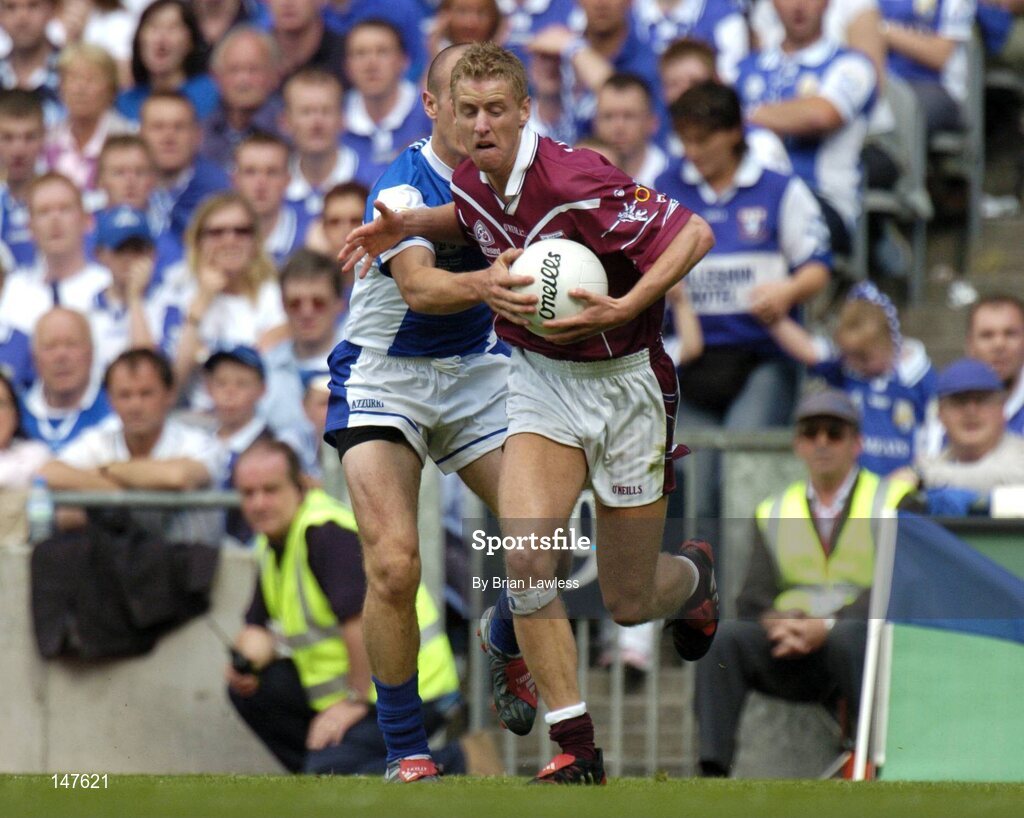 18 July 2004; Denis Glennon, Westmeath, in action against Tom Kelly, Laois. Bank of Ireland Leinster Senior Football Championship Final, Laois v Westmeath, Croke Park, Dublin. Picture credit; Brian Lawless / SPORTSFILE