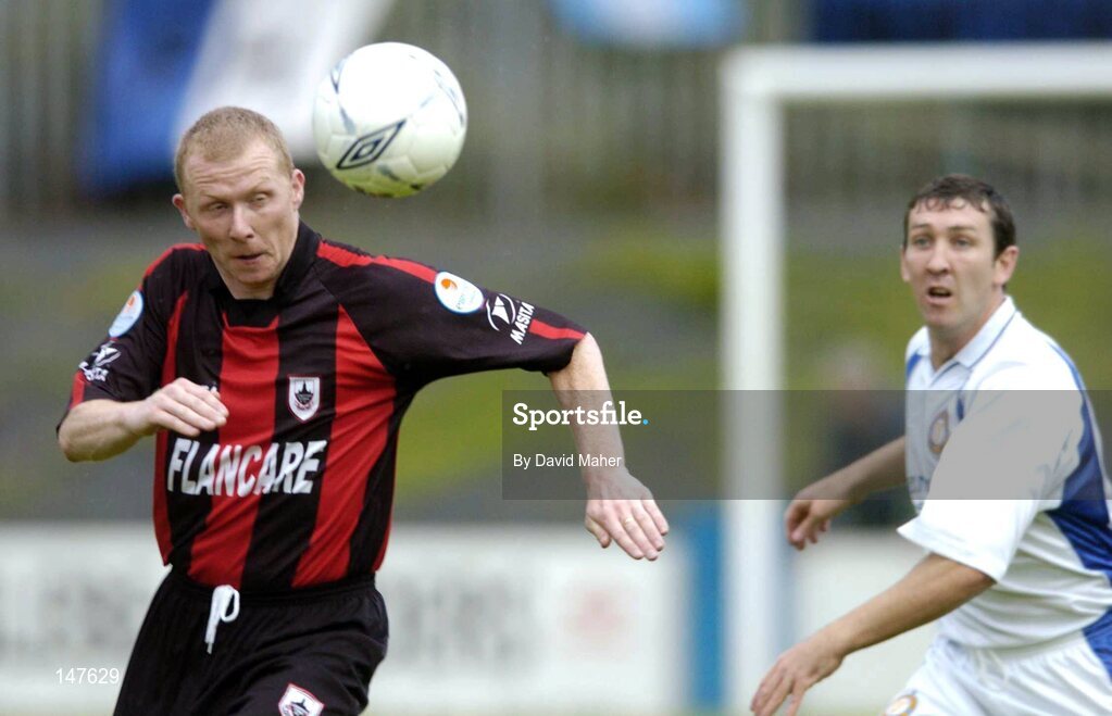 20 July 2004; Sean Francis, Longford Town, in action against Declan Boyle, Finn Harps. eircom League Cup Semi-Final, Finn Harps v Longford Town, Finn Park, Ballybofey, Co. Donegal. Picture credit; David Maher / SPORTSFILE