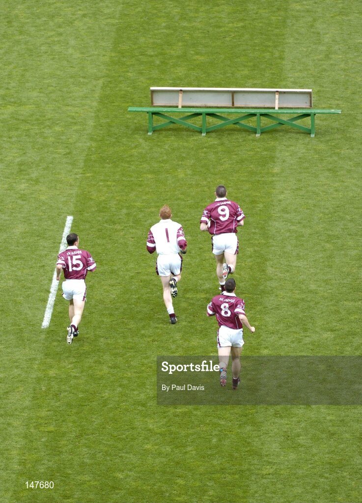 18 July 2004; Members of the Westmeath team make their way to the team bench for the team photograph. Bank of Ireland Leinster Senior Football Championship Final, Laois v Westmeath, Croke Park, Dublin. Picture credit; Ray McManus / SPORTSFILE