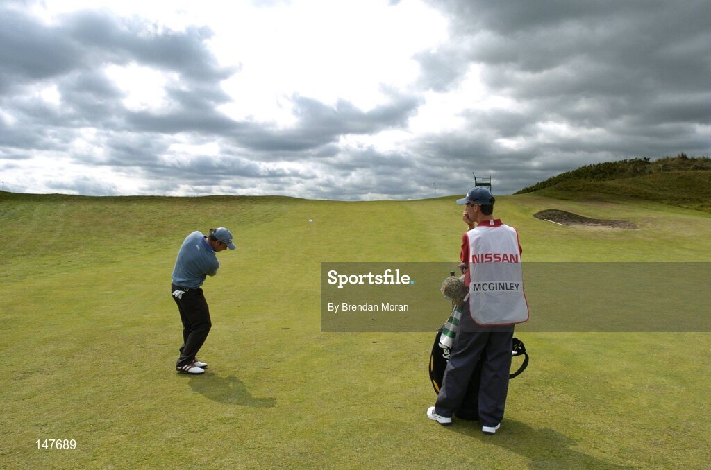 21 July 2004; Paul McGinley plays his second shot up onto the 5th green. Nissan Irish Open Pro Am, County Louth Golf Club, Baltray, Co. Louth. Picture credit; Brendan Moran / SPORTSFILE