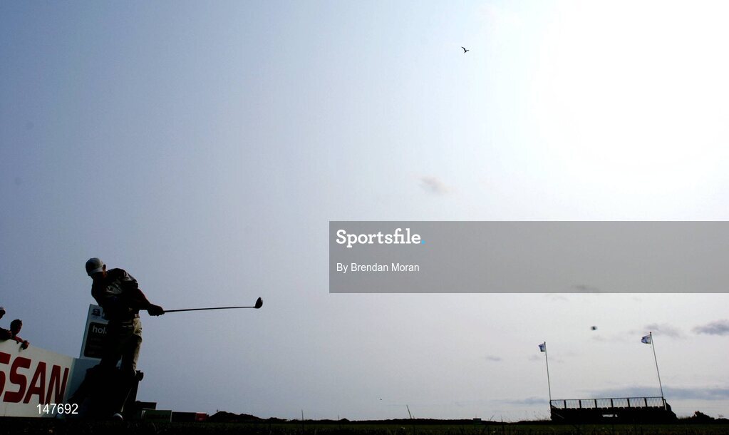 21 July 2004; Padraig Harrington drives from the 2nd tee box. Nissan Irish Open Pro Am, County Louth Golf Club, Baltray, Co. Louth. Picture credit; Brendan Moran / SPORTSFILE