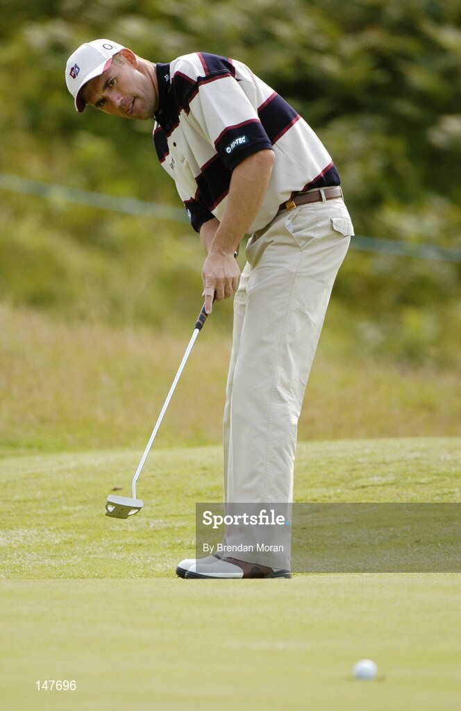 21 July 2004; Padraig Harrington watches as his ball just drops into the hole on the 3rd green. Nissan Irish Open Pro Am, County Louth Golf Club, Baltray, Co. Louth. Picture credit; Brendan Moran / SPORTSFILE