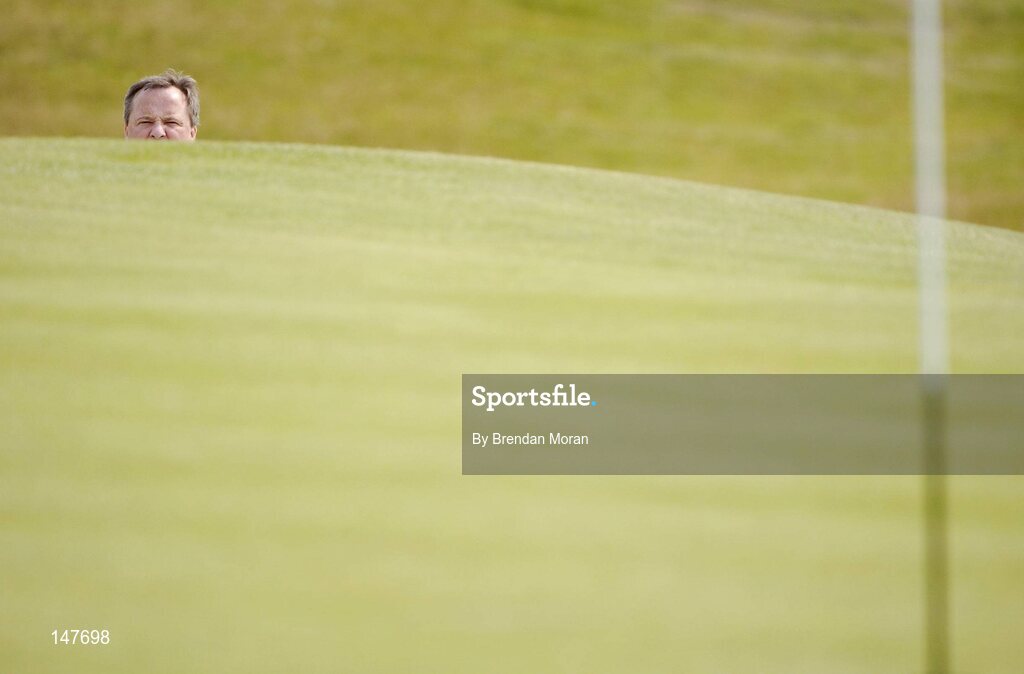 21 July 2004; Dublin football manager Tommy Lyons checks to see where his bunker shot landed on the 7th green. Nissan Irish Open Pro Am, County Louth Golf Club, Baltray, Co. Louth. Picture credit; Brendan Moran / SPORTSFILE