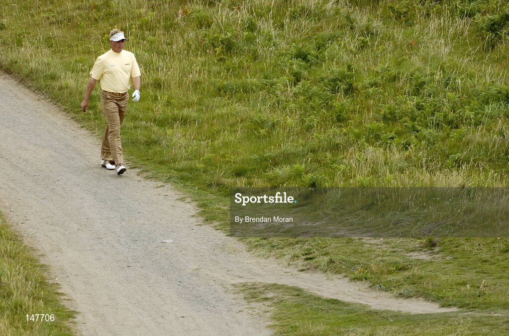 21 July 2004; Darren Clarke makes his way to the 5th green. Nissan Irish Open Pro Am, County Louth Golf Club, Baltray, Co. Louth. Picture credit; Brendan Moran / SPORTSFILE