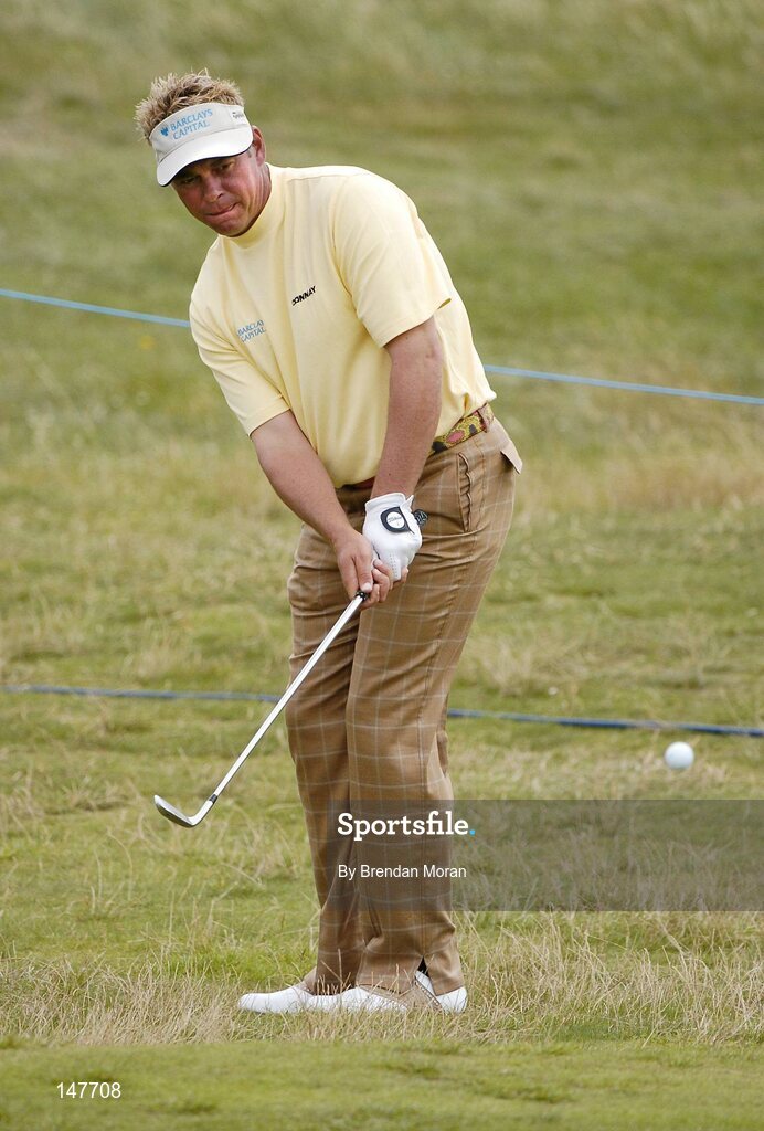 21 July 2004; Darren Clarke chips up onto the 5th green. Nissan Irish Open Pro Am, County Louth Golf Club, Baltray, Co. Louth. Picture credit; Brendan Moran / SPORTSFILE