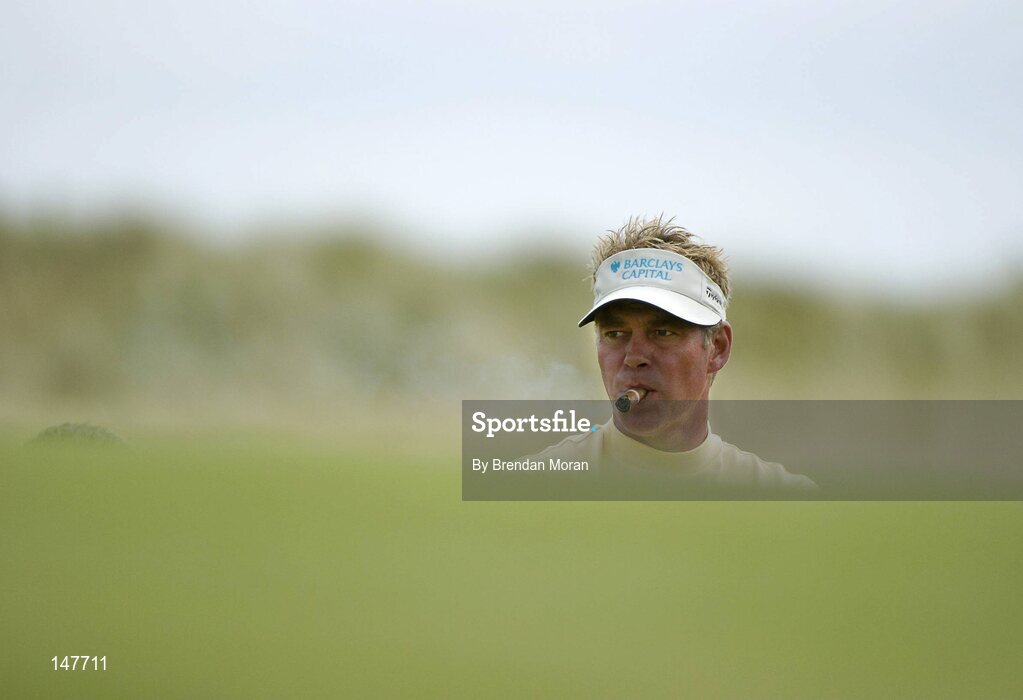21 July 2004; Darren Clarke smokes his cigar while waiting to putt on the 6th green. Nissan Irish Open Pro Am, County Louth Golf Club, Baltray, Co. Louth. Picture credit; Brendan Moran / SPORTSFILE