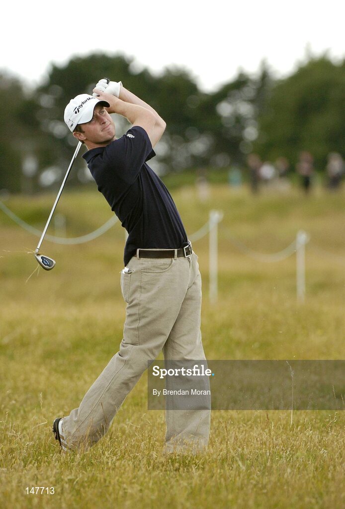 21 July 2004; Danny Sugrue watches his second shot to the 1st green. Nissan Irish Open Pro Am, County Louth Golf Club, Baltray, Co. Louth. Picture credit; Brendan Moran / SPORTSFILE