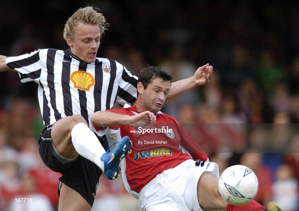 21 July 2004; Alan Moore, Shelbourne, in action against Kristjan Sigurosson, KR Reykjavik. UEFA Champions League 1st Qualifying Round, Second Leg, Shelbourne v KR Reykjavik, Tolka Park, Dublin. Picture credit; David Maher / SPORTSFILE