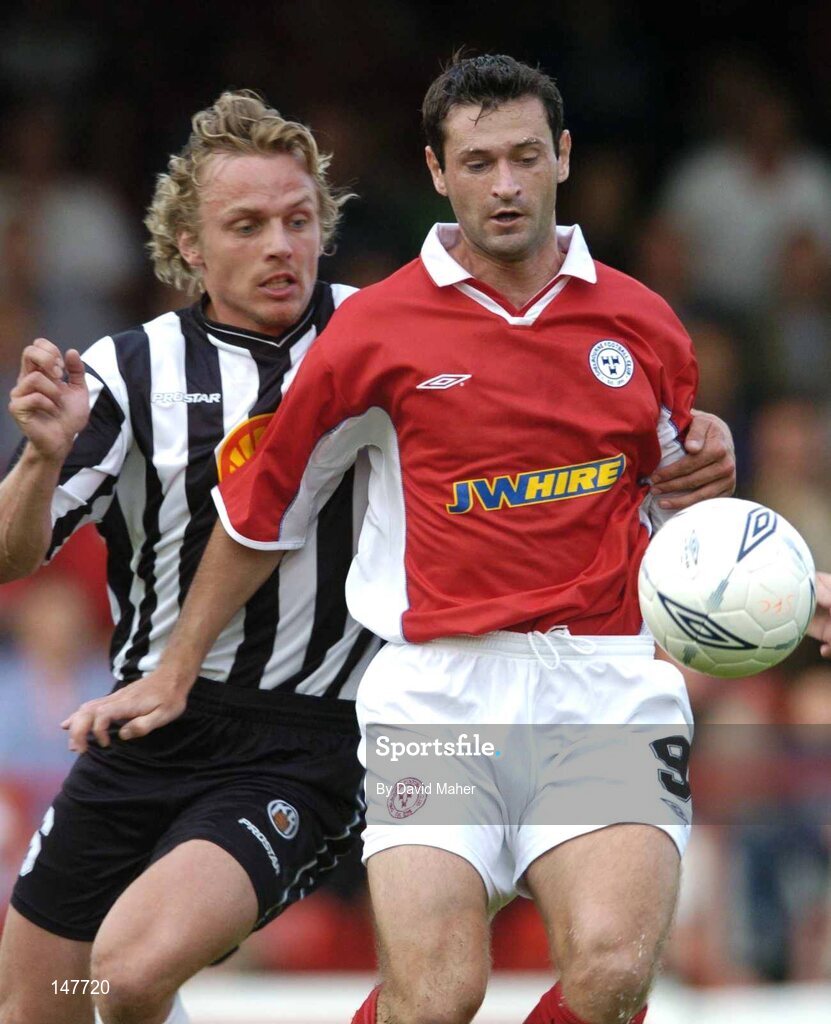 21 July 2004; Alan Moore, Shelbourne, in action against Kristjan Sigurosson, KR Reykjavik. UEFA Champions League 1st Qualifying Round, Second Leg, Shelbourne v KR Reykjavik, Tolka Park, Dublin. Picture credit; David Maher / SPORTSFILE
