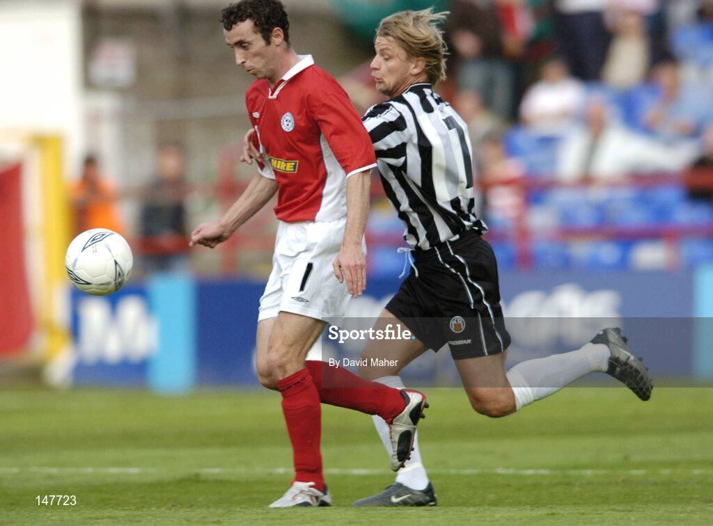 21 July 2004; Ollie Byrne, Shelbourne, in action against Thor Agust Gylfason, KR Reykjavik. UEFA Champions League 1st Qualifying Round, Second Leg, Shelbourne v KR Reykjavik, Tolka Park, Dublin. Picture credit; David Maher / SPORTSFILE