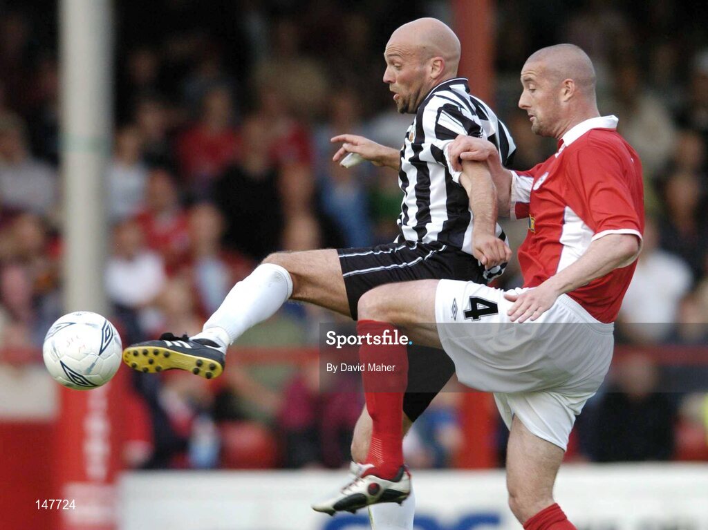 21 July 2004; Arnar Gunnlaugsson, KR Reykjavik, in action against Dave Rogers, Shelbourne. UEFA Champions League 1st Qualifying Round, Second Leg, Shelbourne v KR Reykjavik, Tolka Park, Dublin. Picture credit; David Maher / SPORTSFILE