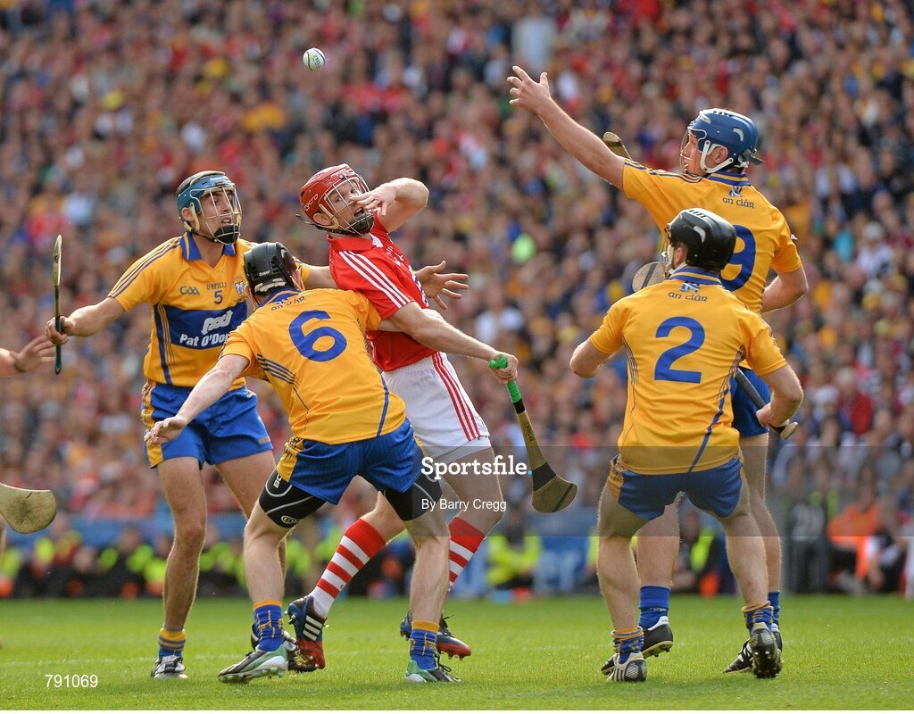 8 September 2013; Stephen Moylan, Cork, in action against Clare players, from left, Brendan Bugler, Patrick Donnellan, Domhnall O'Donovan and Conor Ryan. GAA Hurling All-Ireland Senior Championship Final, Cork v Clare, Croke Park, Dublin. Picture credit: Barry Cregg / SPORTSFILE