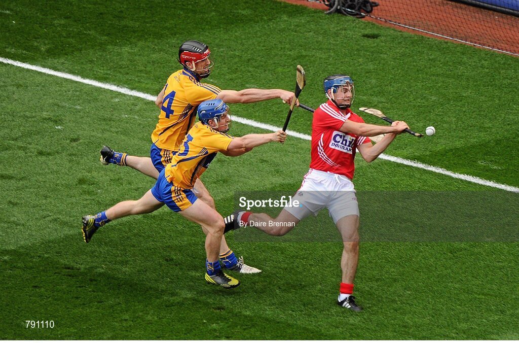 8 September 2013; Christopher Joyce, Cork, in action against Darach Honan, left, and Pádraic Collins, Clare. GAA Hurling All-Ireland Senior Championship Final, Cork v Clare, Croke Park, Dublin. Picture credit: Dáire Brennan / SPORTSFILE