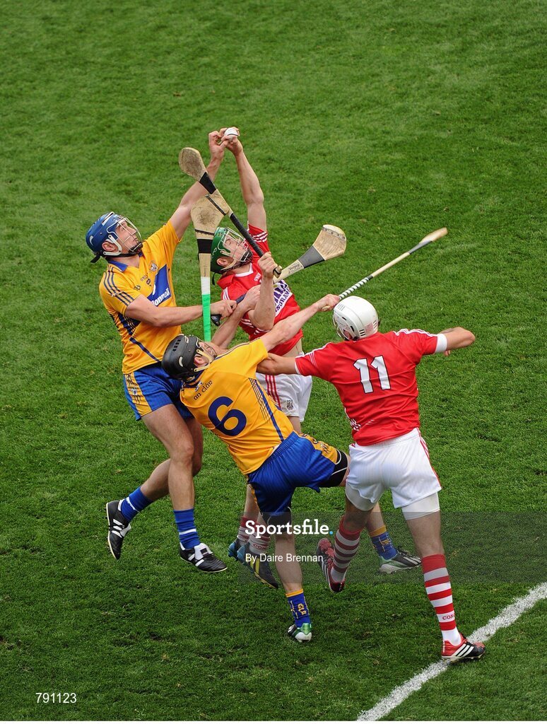 8 September 2013; Séamus Harnedy, left, and Pa Cronin, Cork, in action against Conor Ryan, left, and Patrick Donnellan, Clare. GAA Hurling All-Ireland Senior Championship Final, Cork v Clare, Croke Park, Dublin. Picture credit: Dáire Brennan / SPORTSFILE