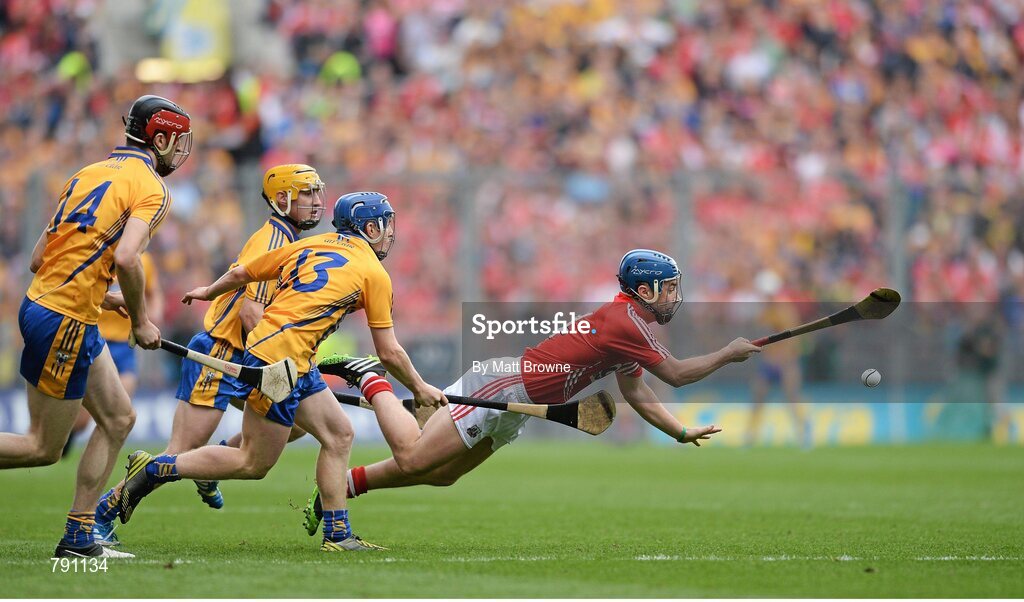 8 September 2013; Conor O'Sullivan, Cork, in action against Darach Honan, 14, Padraic Collons, 13, and Colm Galvin, Clare. GAA Hurling All-Ireland Senior Championship Final, Cork v Clare, Croke Park, Dublin. Picture credit: Matt Browne / SPORTSFILE