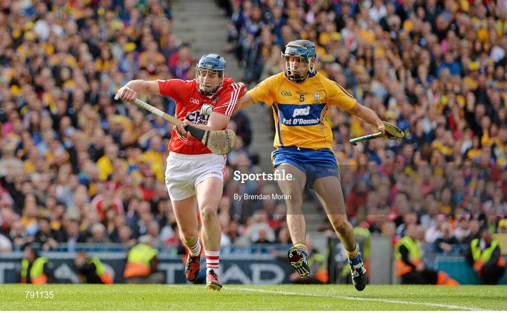 8 September 2013; Patrick Horgan, Cork, controls the sliothar ahead of Brendan Bugler, Clare, on his way to scoring his side's last point of the game, which put them into the lead before Clare equalised to send the game to a replay. GAA Hurling All-Ireland Senior Championship Final, Cork v Clare, Croke Park, Dublin. Picture credit: Brendan Moran / SPORTSFILE