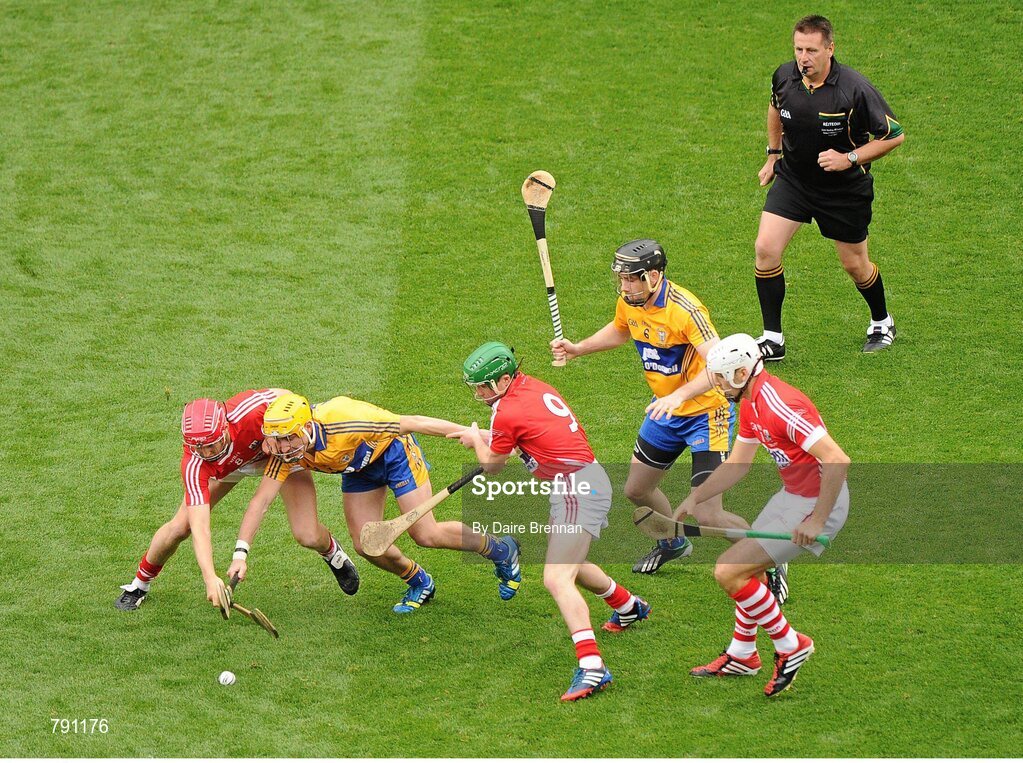 8 September 2013; Lorcán McLoughlin, left, Daniel Kearney, and Pa Cronin, right Cork, in action against Colm Galvin, left, and Patrick Donnellan, Clare, just after referee Brian Gavin threw the ball in. GAA Hurling All-Ireland Senior Championship Final, Cork v Clare, Croke Park, Dublin. Picture credit: Dáire Brennan / SPORTSFILE
