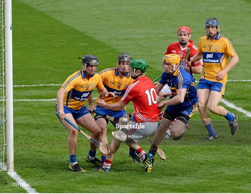 8 September 2013; Cork's Séamus Harnedy rushes in on Clare goalkeeper Patrick Kelly, captain Patrick Donnellan and Colin Ryan after they had combined to save a  Cork penalty late in the game. GAA Hurling All-Ireland Senior Championship Final, Cork v Clare, Croke Park, Dublin. Picture credit: Ray McManus / SPORTSFILE