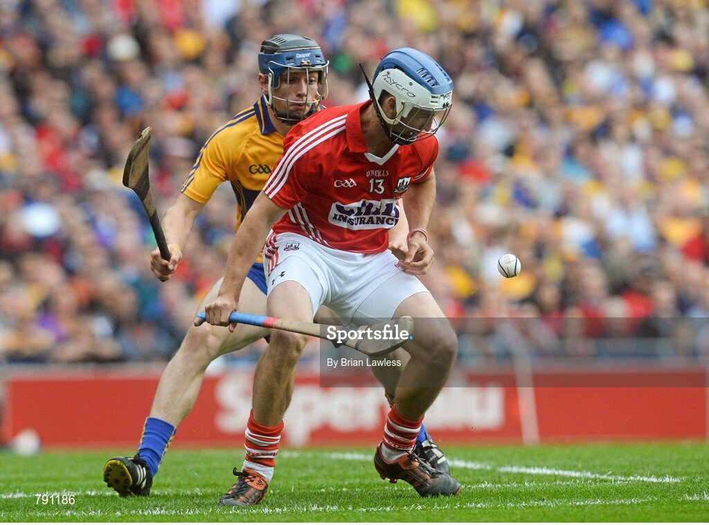 8 September 2013; Luke O'Farrell, Cork, in action against David McInerney, Clare. GAA Hurling All-Ireland Senior Championship Final, Cork v Clare, Croke Park, Dublin. Picture credit: Brian Lawless / SPORTSFILE
