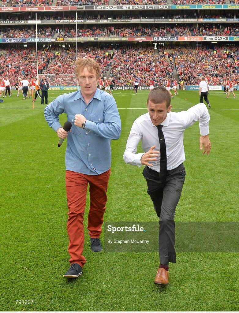 8 September 2013; Men's 50km walk world champion Robert Heffernan and MC Hector O hEochagain 'Do The Heff'. GAA Hurling All-Ireland Senior Championship Final, Cork v Clare, Croke Park, Dublin. Picture credit: Stephen McCarthy / SPORTSFILE