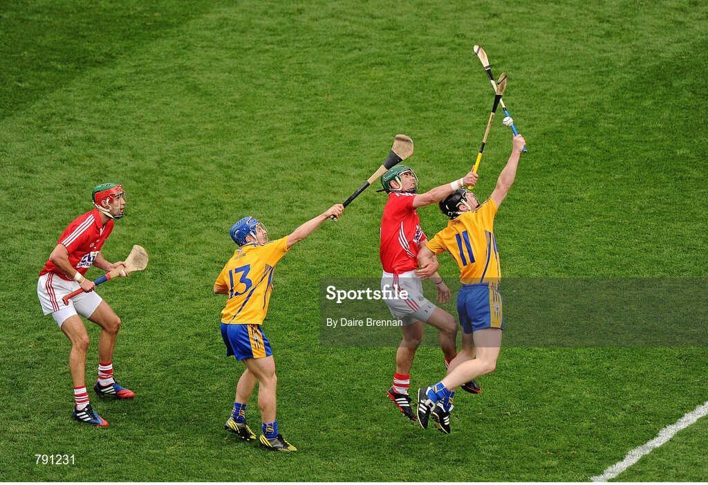 8 September 2013; Tony Kelly, right, and Pádraic Collins, Clare, in action against Stephen McDonnell, left, and William Egan, Cork. GAA Hurling All-Ireland Senior Championship Final, Cork v Clare, Croke Park, Dublin. Picture credit: Dáire Brennan / SPORTSFILE