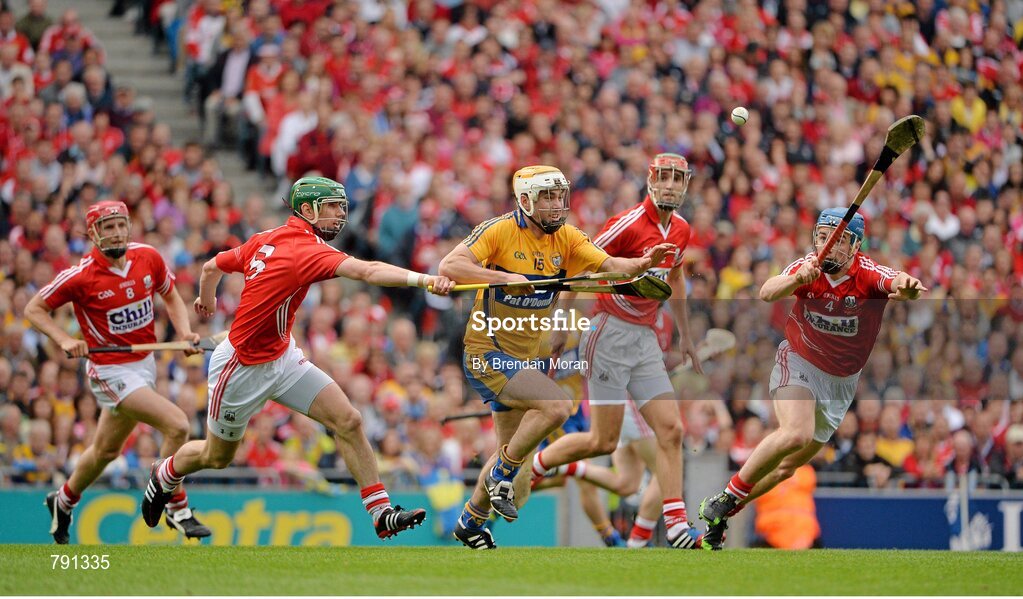 8 September 2013; Conor McGrath, Clare, in action against Cork players, from left, Lorcán McLoughlin, Brian Murphy, Stephen McDonnell and Conor O'Sullivan. GAA Hurling All-Ireland Senior Championship Final, Cork v Clare, Croke Park, Dublin. Picture credit: Brendan Moran / SPORTSFILE