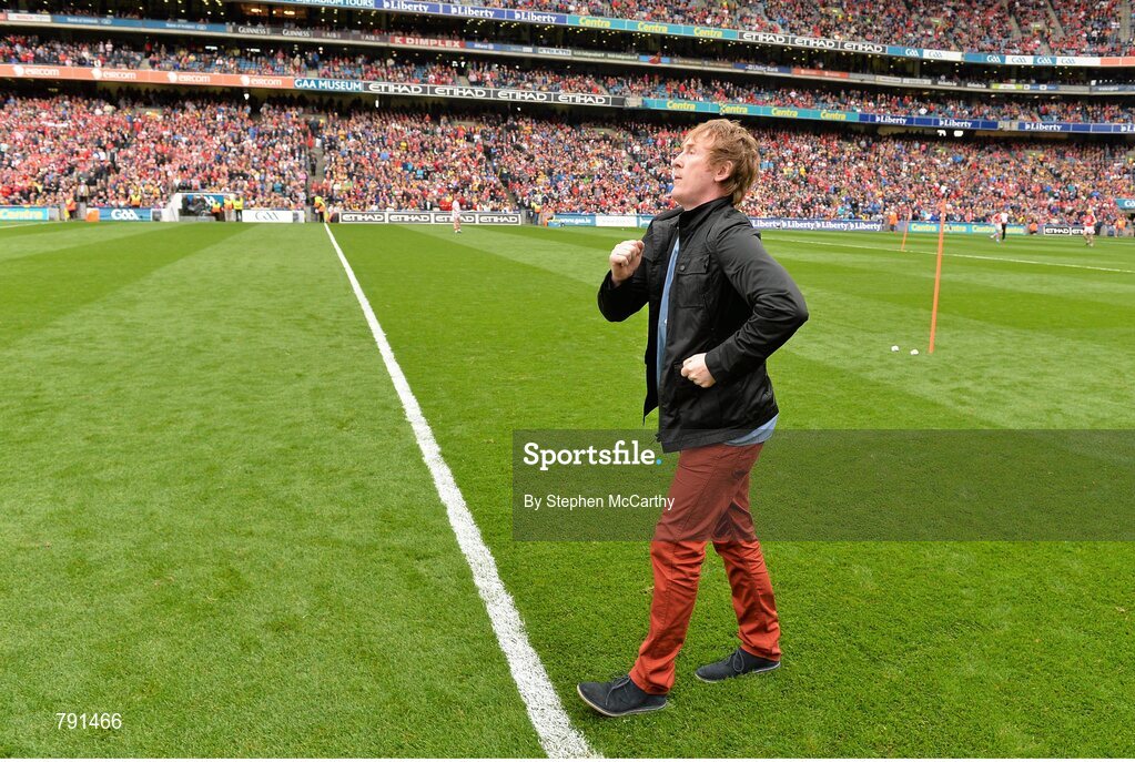 8 September 2013; MC Hector O hEochagain does "The Heff" in honour of Men's 50km walk world champion Robert Heffernan. GAA Hurling All-Ireland Senior Championship Final, Cork v Clare, Croke Park, Dublin. Picture credit: Stephen McCarthy / SPORTSFILE