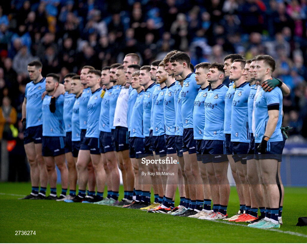 17 February 2024; Dublin players during a minutes silence in memory of the late Dublin selector Shane O'Hanlon before the Allianz Football League Division 1 match between Dublin and Roscommon at Croke Park in Dublin. Photo by Ray McManus/Sportsfile