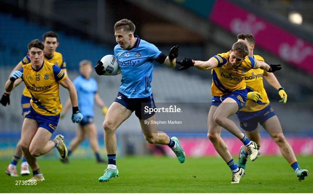 17 February 2024; Seán Bugler of Dublin is tackled by Evan Flynn of Roscommon during the Allianz Football League Division 1 match between Dublin and Roscommon at Croke Park in Dublin. Photo by Stephen Marken/Sportsfile