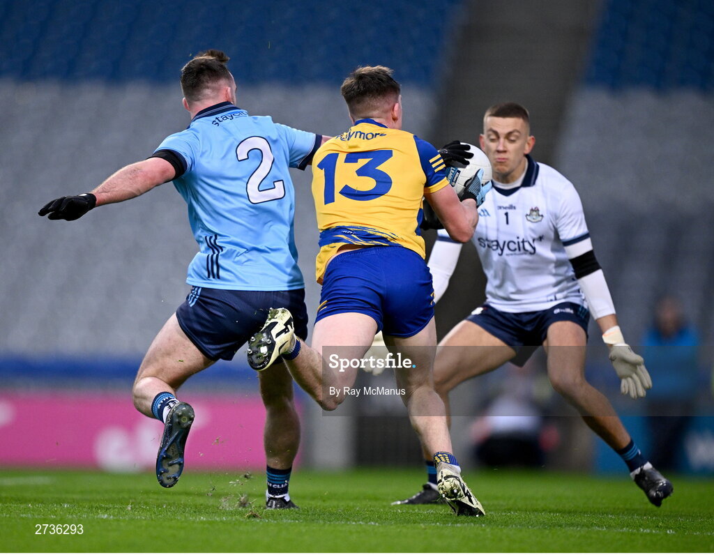 17 February 2024; Séan MacMahon and Dublin goalkeeper David O'Hanlon watch as Dáire Cregg  of Roscommon's 'shot' heads to the back of the net, only to be disallowed' during the Allianz Football League Division 1 match between Dublin and Roscommon at Croke Park in Dublin. Photo by Ray McManus/Sportsfile