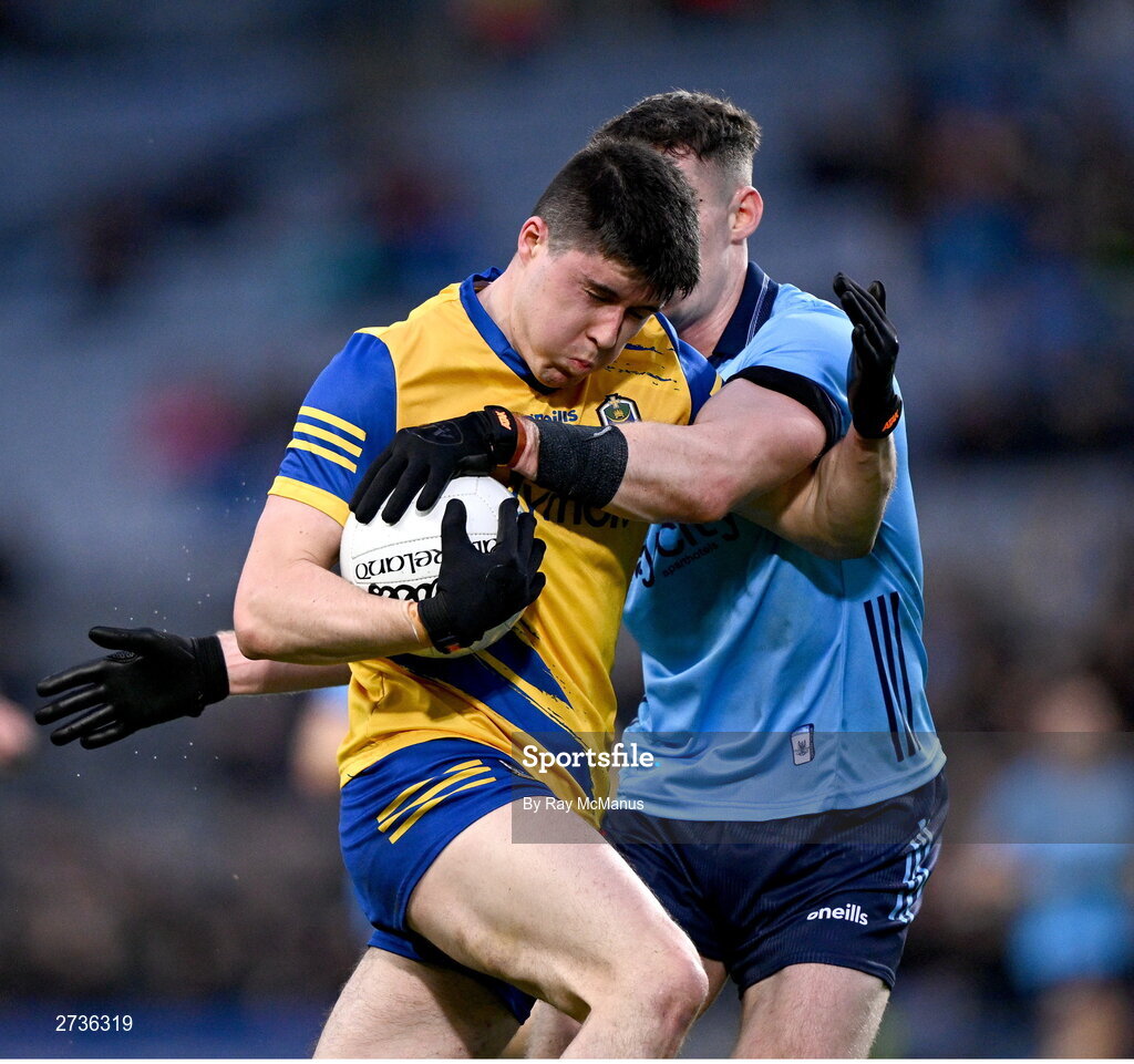 17 February 2024; Niall Higgins of Roscommon is tackled by Lee Gannon of Dublin during the Allianz Football League Division 1 match between Dublin and Roscommon at Croke Park in Dublin. Photo by Ray McManus/Sportsfile