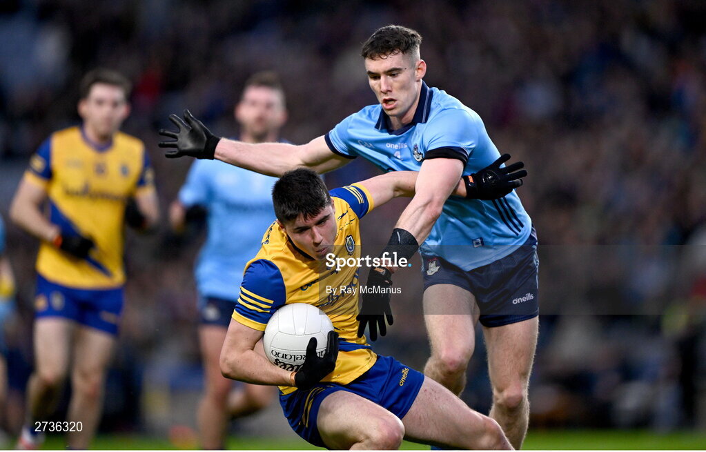 17 February 2024; Niall Higgins of Roscommon is tackled by Lee Gannon of Dublin during the Allianz Football League Division 1 match between Dublin and Roscommon at Croke Park in Dublin. Photo by Ray McManus/Sportsfile