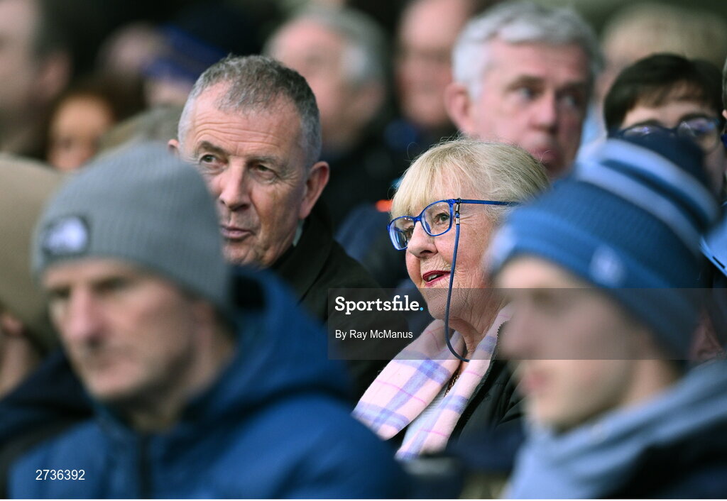17 February 2024; Mary McGoff, wife of the late Dublin selector Shane O'Hanlon, with former Dublin County Board CEO John Costello during the Allianz Football League Division 1 match between Dublin and Roscommon at Croke Park in Dublin. Photo by Ray McManus/Sportsfile