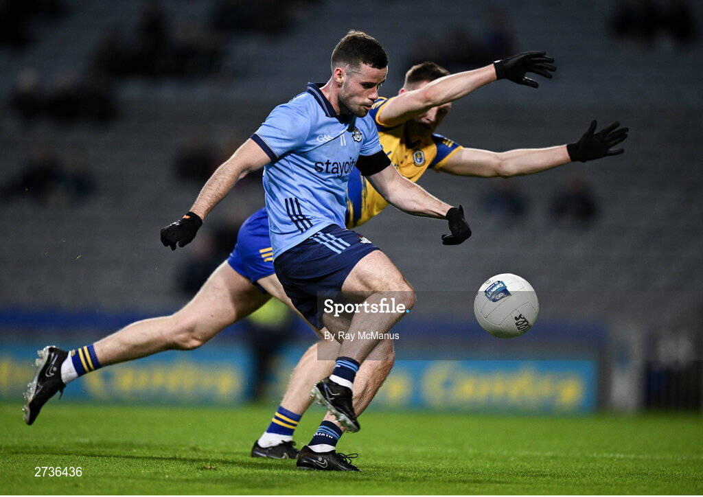 17 February 2024; Ross McGarry of Dublin has his shot blocked by Shane Cunnane of Roscommon during the Allianz Football League Division 1 match between Dublin and Roscommon at Croke Park in Dublin. Photo by Ray McManus/Sportsfile