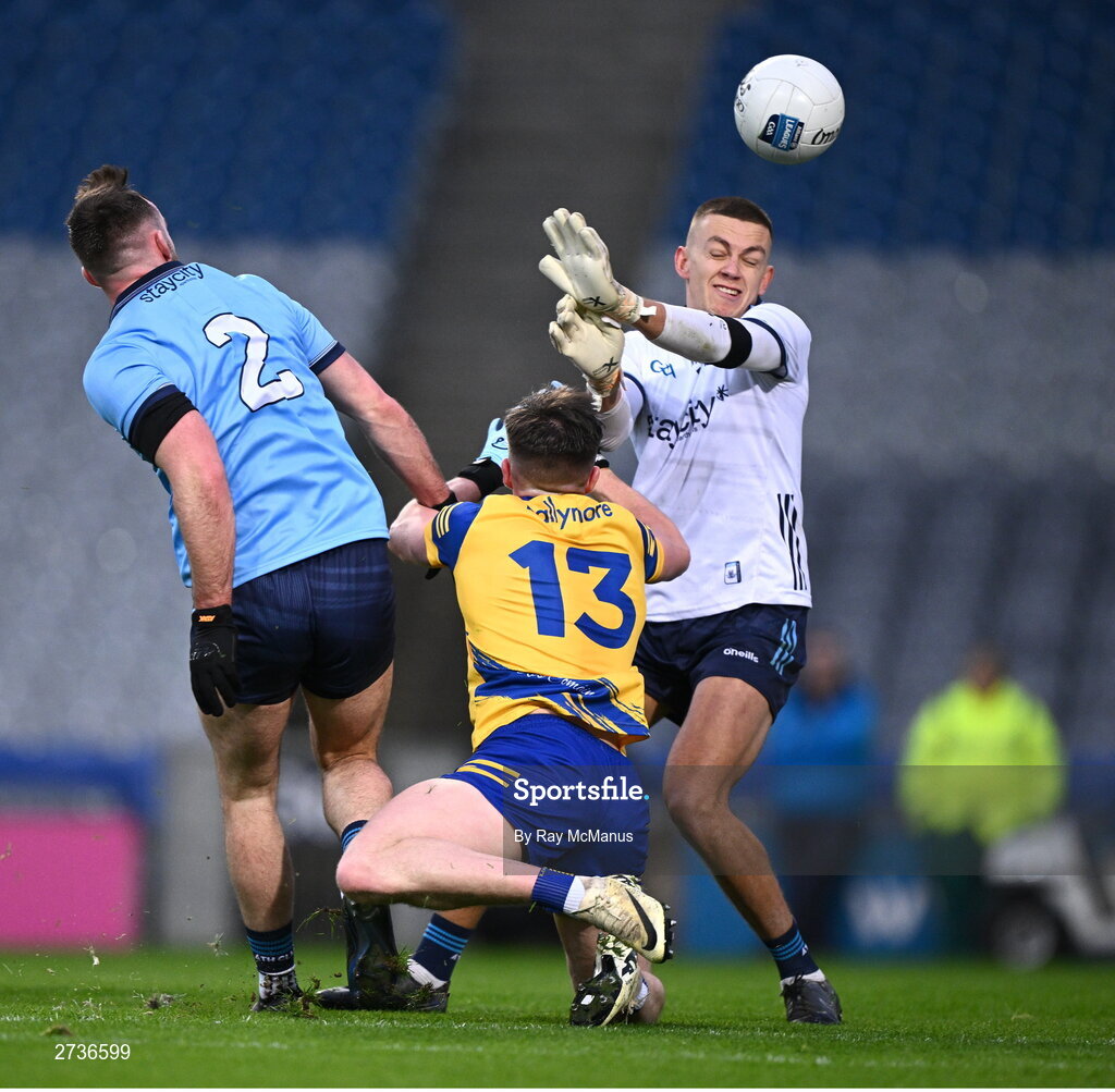 17 February 2024; Séan MacMahon and Dublin goalkeeper David O'Hanlon watch as Dáire Cregg of Roscommon's 'shot' heads to the back of the net, only for the goal to be disallowed during the Allianz Football League Division 1 match between Dublin and Roscommon at Croke Park in Dublin. Photo by Ray McManus/Sportsfile