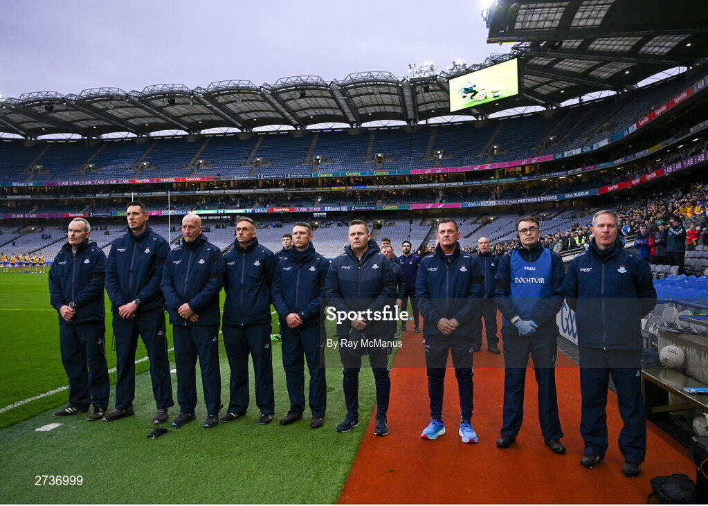 17 February 2024; Dublin officials, left to right, Sean Murphy, backroom, Brian O’Regan, selector, Mick Galvin, selector, Ger Lyons, selector, Darren Daly, selector, Dessie Farrell, Dublin manager, Séamus McCormack, Media Manager, Dr Diarmuid Smyth, James Allen, Chartered Physiotherapist during a minutes silence in memory of the late Dublin selector Shane O'Hanlon before the Allianz Football League Division 1 match between Dublin and Roscommon at Croke Park in Dublin. Photo by Ray McManus/Sportsfile