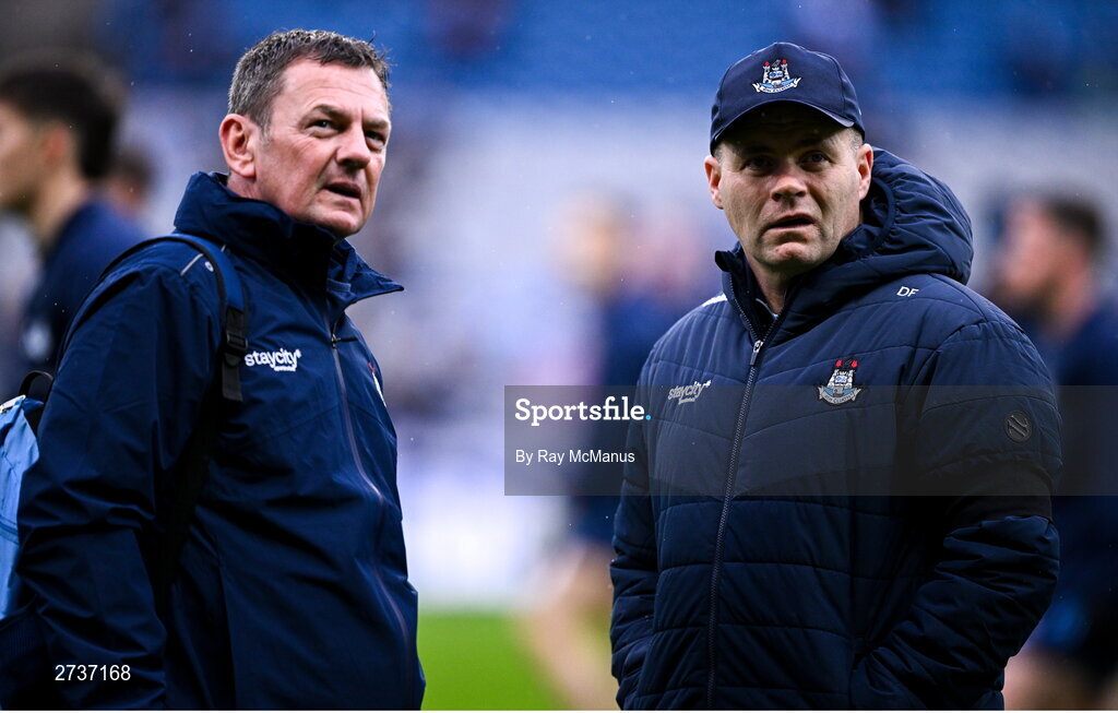 17 February 2024; Dublin Media Officer Séamus McCormack, left, and Dublin manager Dessie Farrell before the Allianz Football League Division 1 match between Dublin and Roscommon at Croke Park in Dublin. Photo by Ray McManus/Sportsfile