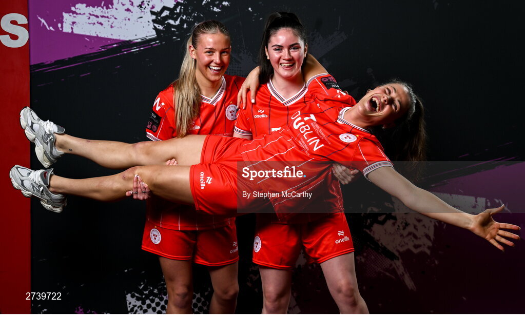 21 February 2024; Players, from left, Nia Hannon, Katie McCarn and Christie Gray during a Shelbourne FC squad portraits at Tolka Park in Dublin. Photo by Stephen McCarthy/Sportsfile