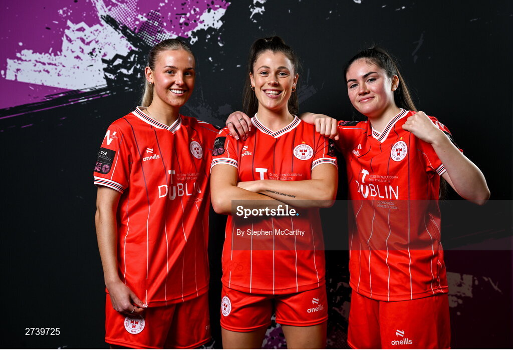 21 February 2024; Players, from left, Nia Hannon, Christie Gray and Katie McCarn during a Shelbourne FC squad portraits at Tolka Park in Dublin. Photo by Stephen McCarthy/Sportsfile