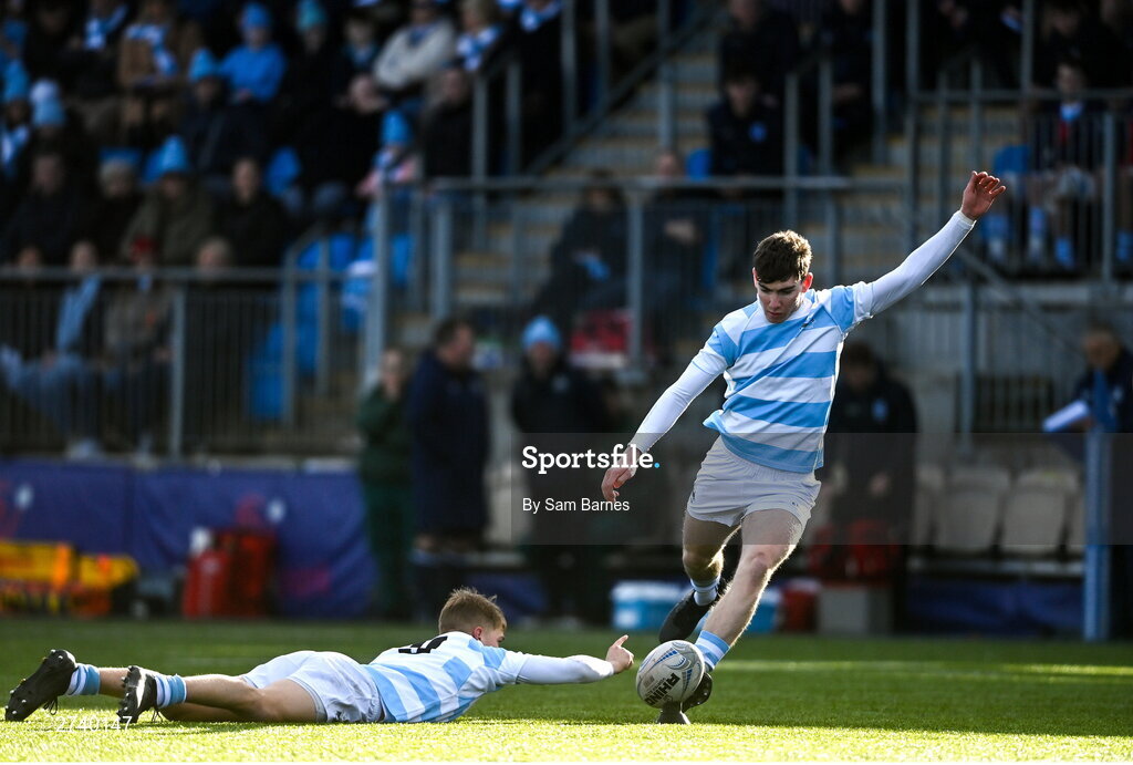 22 February 2024; Conor O'Shaughnessy of Blackrock College kicks a penalty with the help of team-mate Albert Lindner during the Bank of Ireland Leinster Schools Senior Cup quarter-final match between Cistercian College, Roscrea and Blackrock College at Energia Park in Dublin. Photo by Sam Barnes/Sportsfile