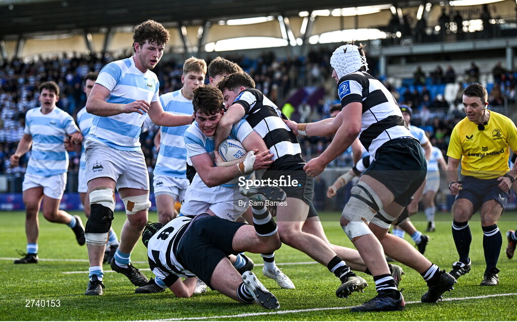22 February 2024; Donnacha McGuire of Blackrock College is stopped short of the try line by Evan Brophy, left, and Jack Deegan of Cistercian College Roscrea during the Bank of Ireland Leinster Schools Senior Cup quarter-final match between Cistercian College, Roscrea and Blackrock College at Energia Park in Dublin. Photo by Sam Barnes/Sportsfile
